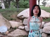 Asian amateur gives an outdoor blowjob